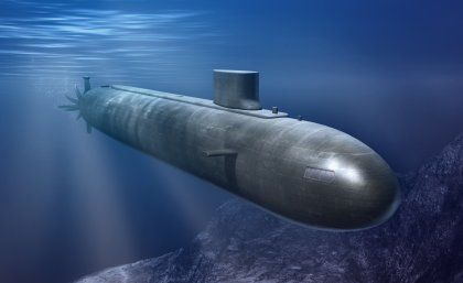 A grey aerodynamic submarine submerged in blue water